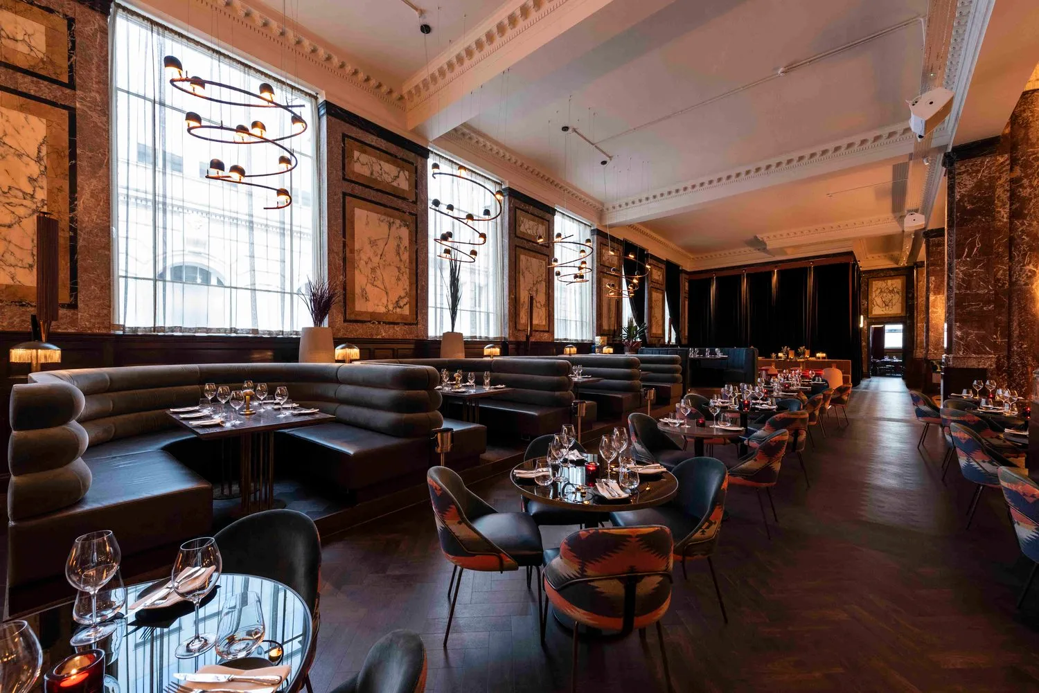 Dark Walnut Amtico parquet through the restaurant's window booths at Gaucho Liverpool