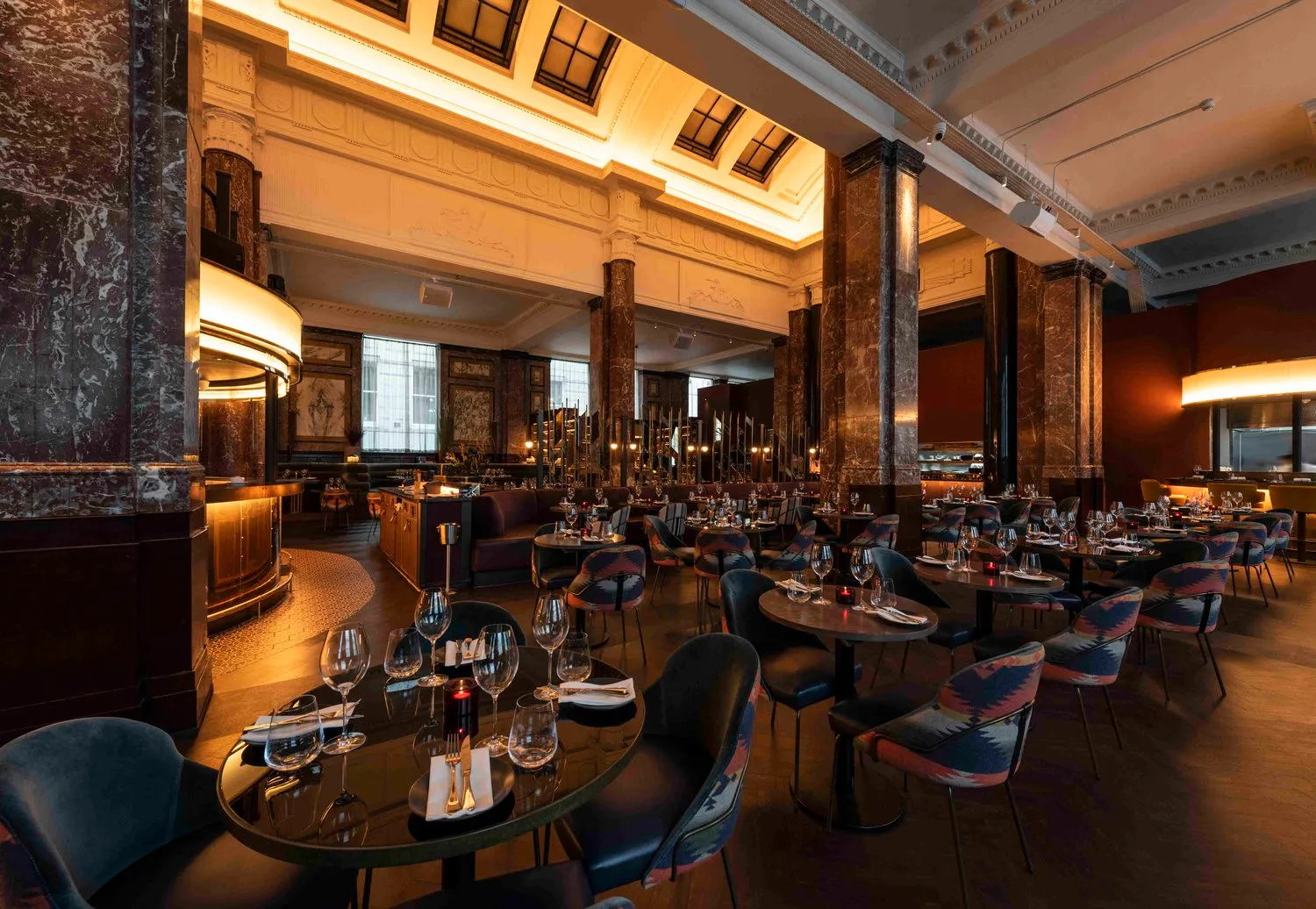 Dark Walnut Amtico parquet across the main restaurant in the former banking hall at Gaucho Liverpool
