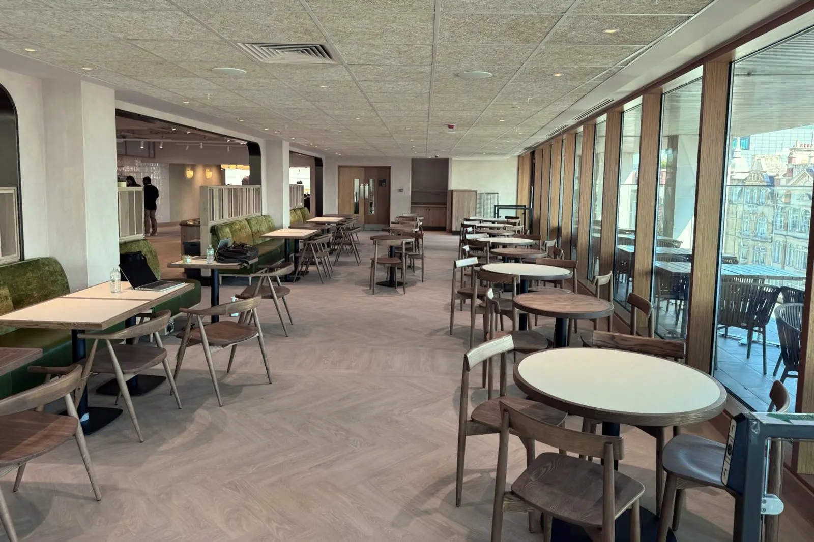 Herringbone LVT along the glazed side of the dining room, looking towards the inner dining areas